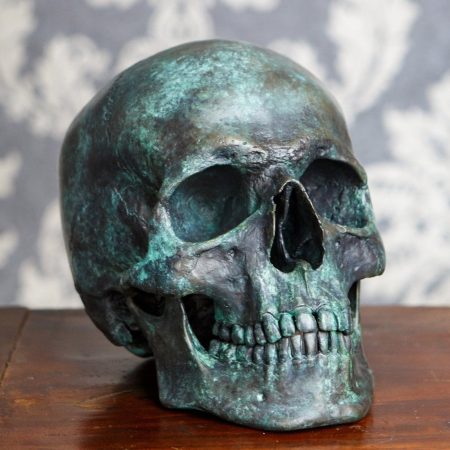 Bronze Human Skull Sculpture with a Verdigris Patina - Hand made by Skelemental at Raven Armoury, Thaxted England Also available in other finishes including steel and patinations.
